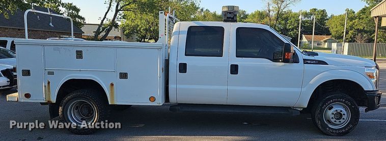 image for item LE9727 2014 Ford F350  Crew Cab utility bed pickup truck