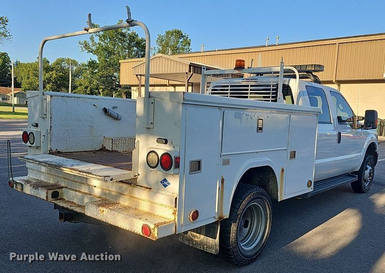 image for item LE9727 2014 Ford F350  Crew Cab utility bed pickup truck