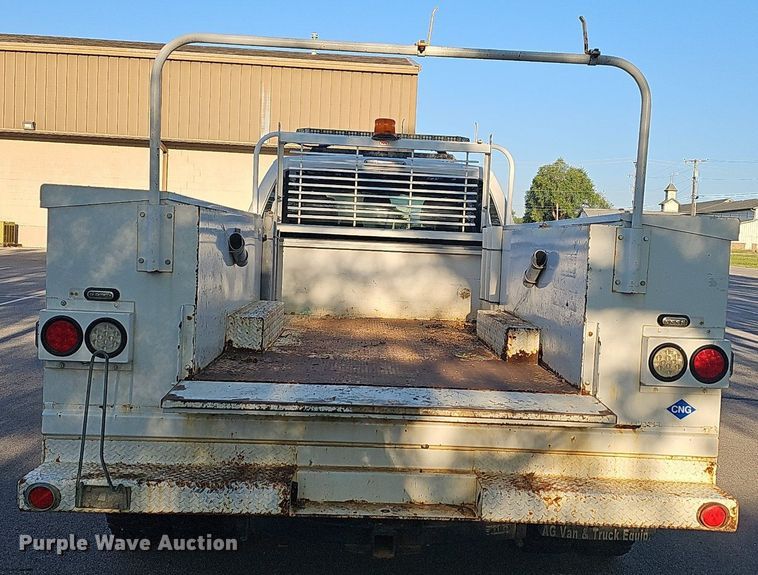 image for item LE9727 2014 Ford F350  Crew Cab utility bed pickup truck