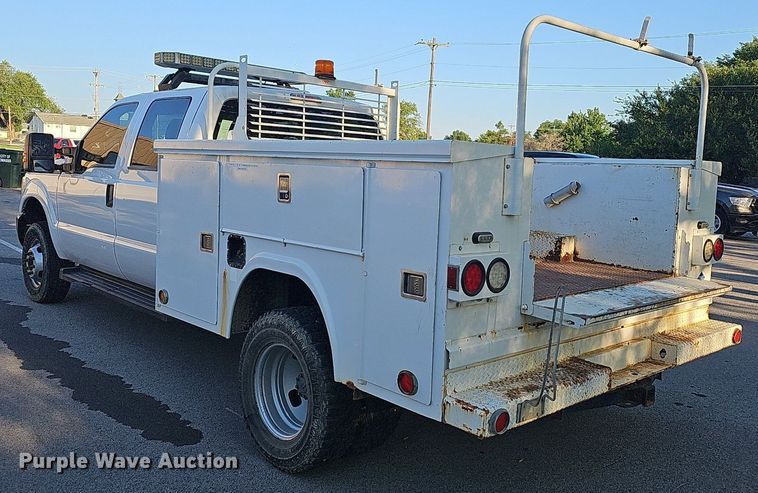 image for item LE9727 2014 Ford F350  Crew Cab utility bed pickup truck