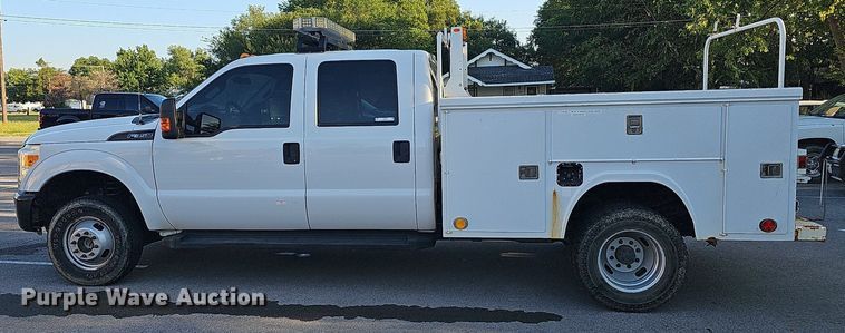 image for item LE9727 2014 Ford F350  Crew Cab utility bed pickup truck