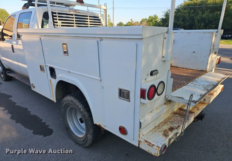 image for item LE9727 2014 Ford F350  Crew Cab utility bed pickup truck