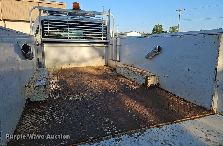 image for item LE9727 2014 Ford F350  Crew Cab utility bed pickup truck