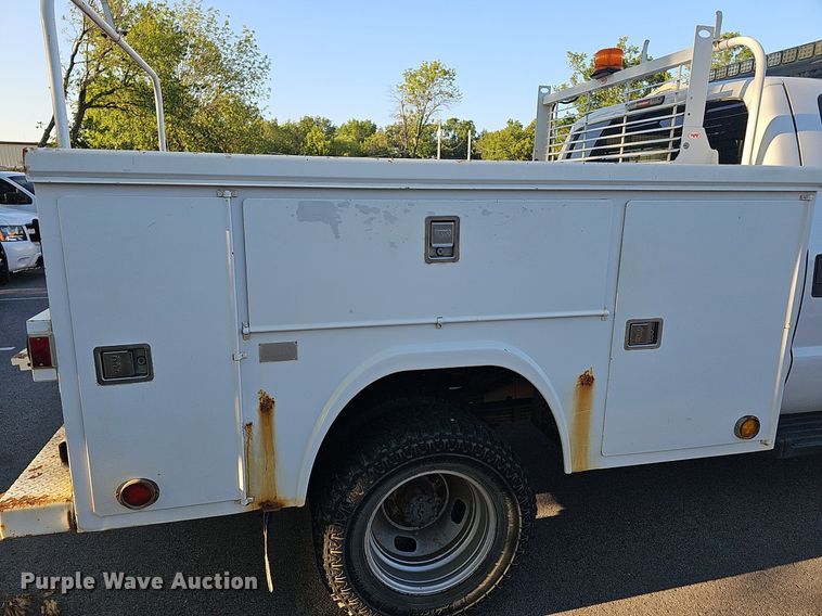 image for item LE9727 2014 Ford F350  Crew Cab utility bed pickup truck