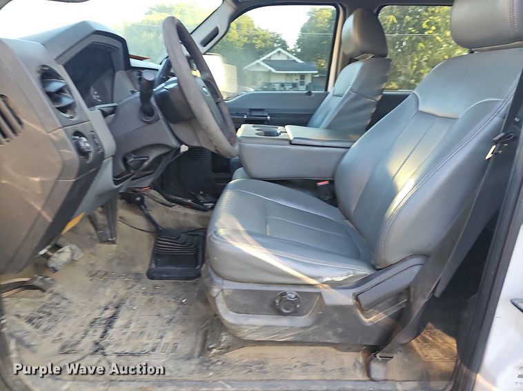 image for item LE9727 2014 Ford F350  Crew Cab utility bed pickup truck