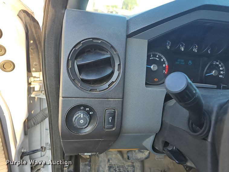 image for item LE9727 2014 Ford F350  Crew Cab utility bed pickup truck