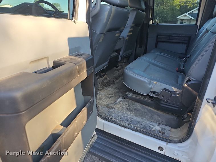 image for item LE9727 2014 Ford F350  Crew Cab utility bed pickup truck