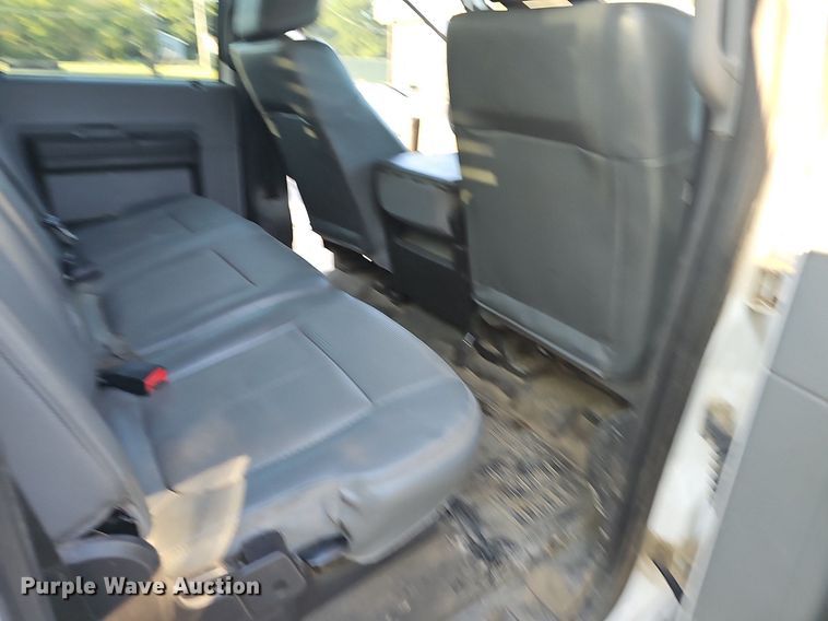 image for item LE9727 2014 Ford F350  Crew Cab utility bed pickup truck