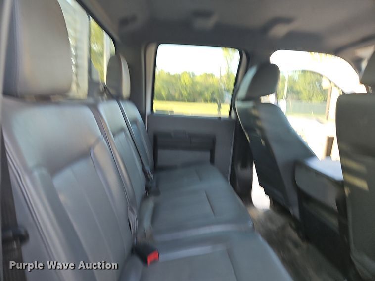 image for item LE9727 2014 Ford F350  Crew Cab utility bed pickup truck