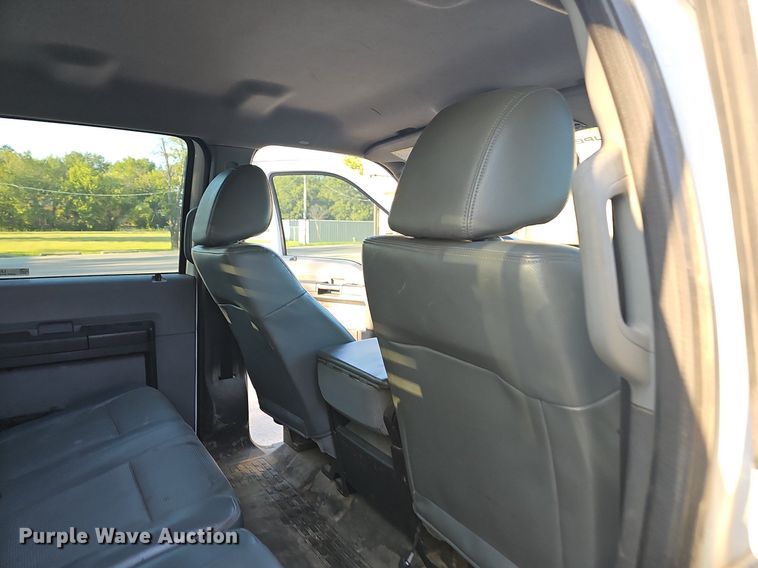 image for item LE9727 2014 Ford F350  Crew Cab utility bed pickup truck