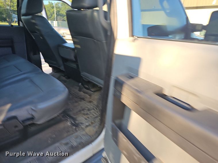 image for item LE9727 2014 Ford F350  Crew Cab utility bed pickup truck