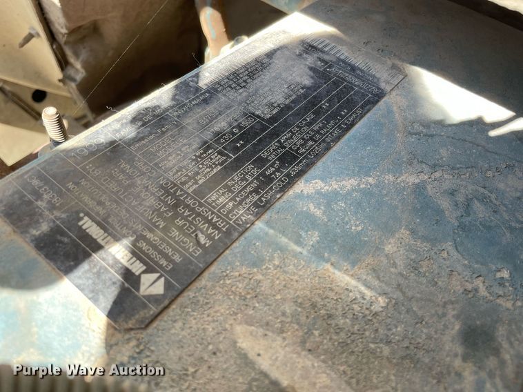 image for item LV9858 1999 International 4700  chipper truck