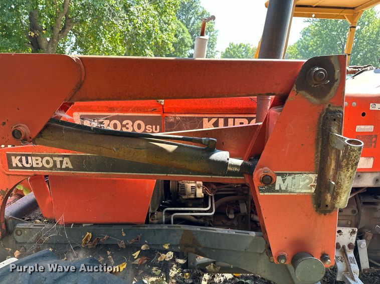image for item OC9218 1985 Kubota M7030SU  tractor