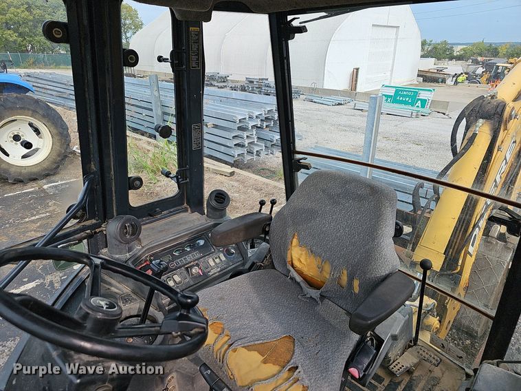 image for item OG9395 2005 John Deere 310SG  backhoe