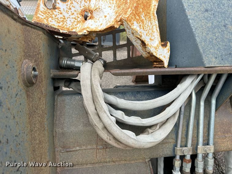 image for item DJ6220 Bobcat 811  skid steer backhoe