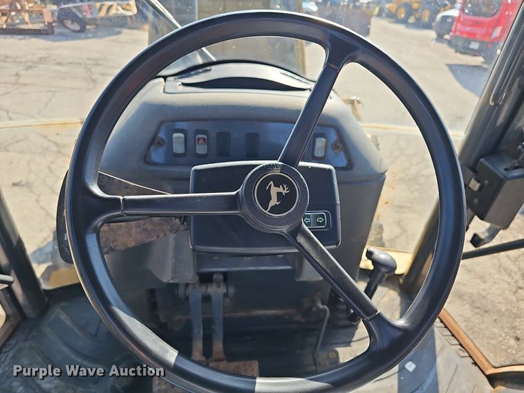 image for item DN8706 2005 John Deere 310G  backhoe