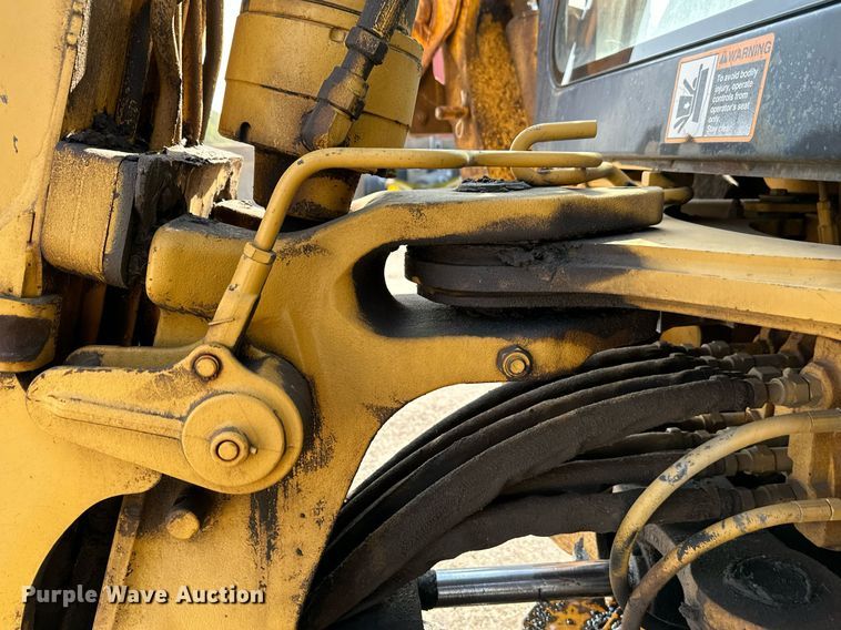 image for item NF9226 1999 John Deere 310E  backhoe