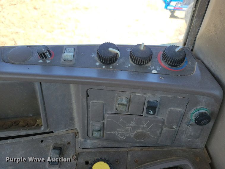 image for item DR5595 2010 John Deere 7330  MFWD tractor