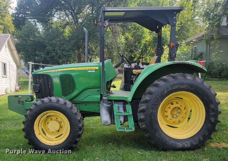 image for item KS9156 2006 John Deere 6415  MFWD tractor
