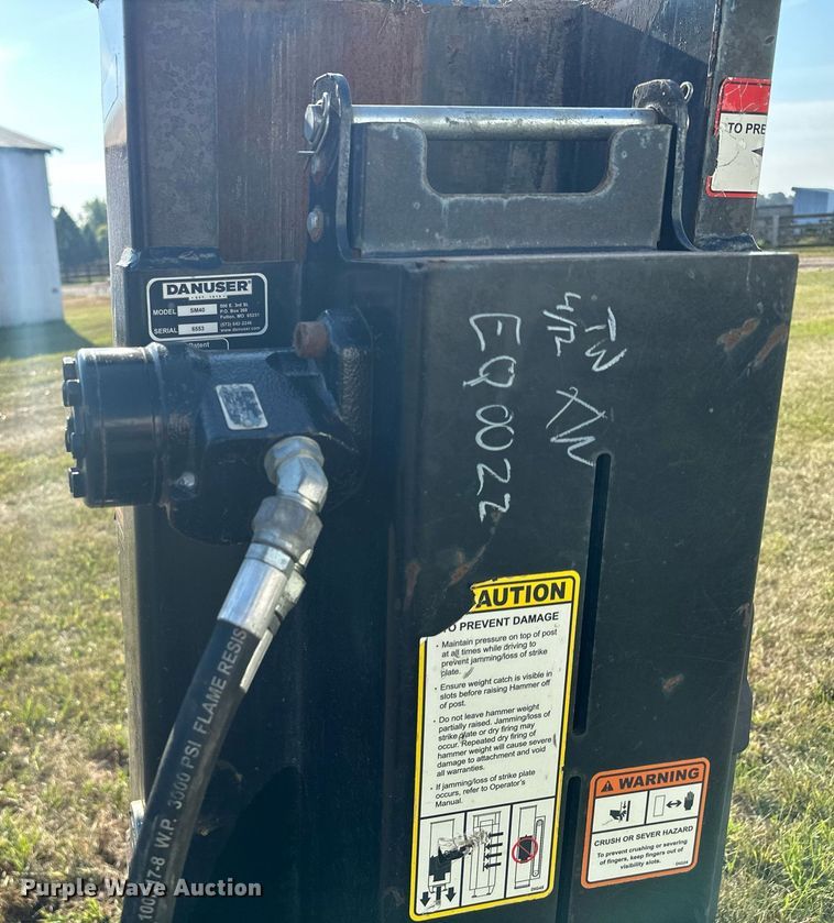 image for item MQ9459 Danuser SM40 skid steer post driver