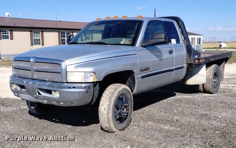 image for item DK8806 2001 Dodge Ram 3500  Quad Cab flatbed pickup truck