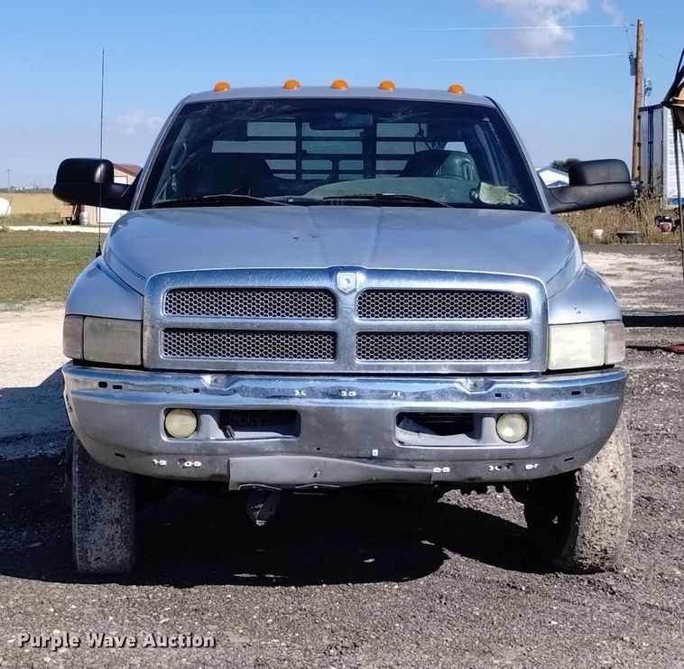 image for item DK8806 2001 Dodge Ram 3500  Quad Cab flatbed pickup truck