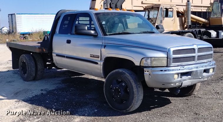 image for item DK8806 2001 Dodge Ram 3500  Quad Cab flatbed pickup truck