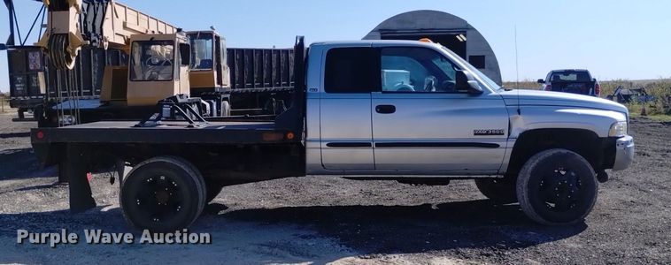 image for item DK8806 2001 Dodge Ram 3500  Quad Cab flatbed pickup truck