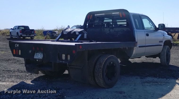 image for item DK8806 2001 Dodge Ram 3500  Quad Cab flatbed pickup truck