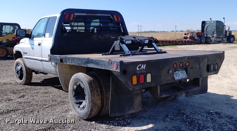 image for item DK8806 2001 Dodge Ram 3500  Quad Cab flatbed pickup truck