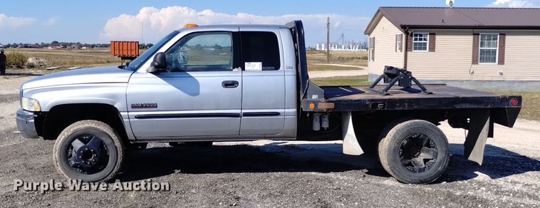 image for item DK8806 2001 Dodge Ram 3500  Quad Cab flatbed pickup truck