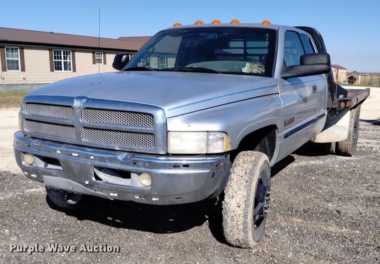 image for item DK8806 2001 Dodge Ram 3500  Quad Cab flatbed pickup truck