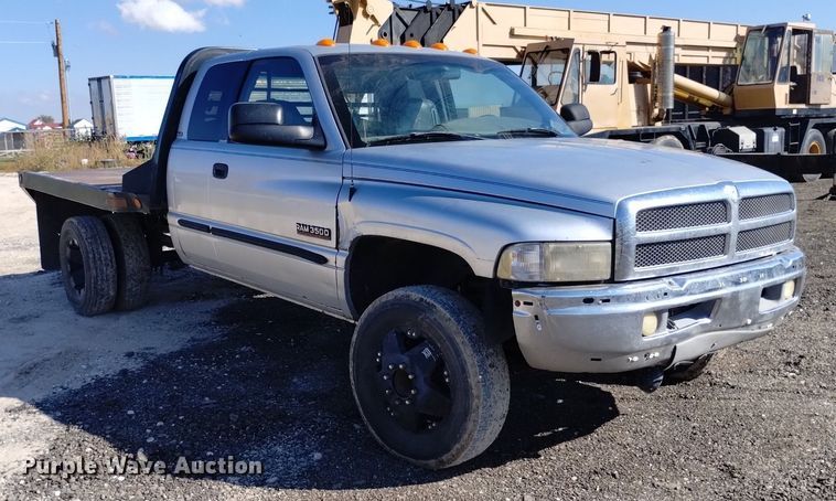 image for item DK8806 2001 Dodge Ram 3500  Quad Cab flatbed pickup truck