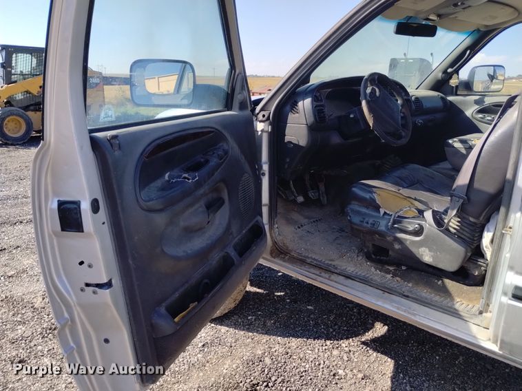 image for item DK8806 2001 Dodge Ram 3500  Quad Cab flatbed pickup truck