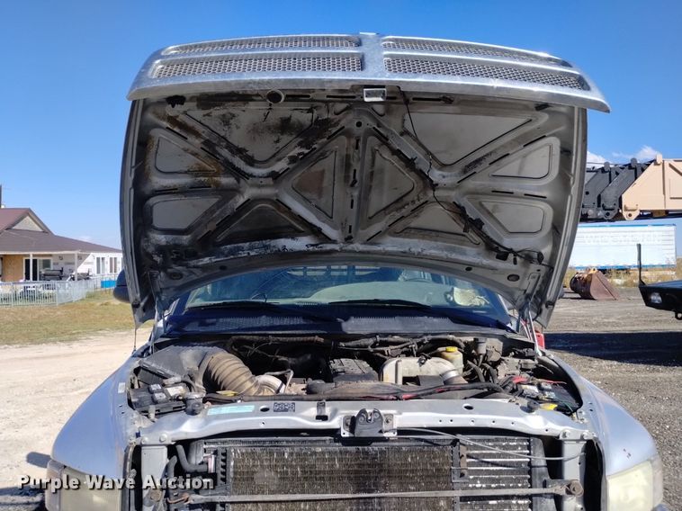 image for item DK8806 2001 Dodge Ram 3500  Quad Cab flatbed pickup truck