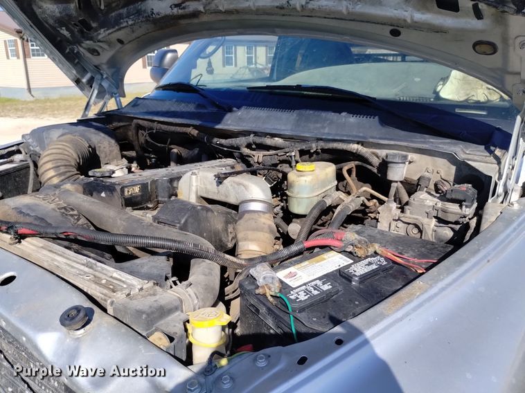 image for item DK8806 2001 Dodge Ram 3500  Quad Cab flatbed pickup truck