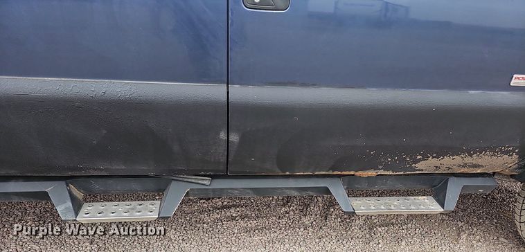 image for item DQ1147 2004 Ford F250 Super Duty Lariat  Crew Cab flatbed pickup truck