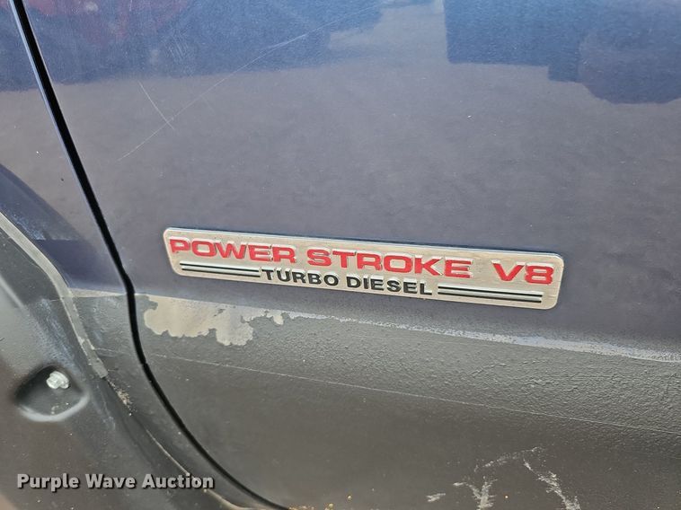 image for item DQ1147 2004 Ford F250 Super Duty Lariat  Crew Cab flatbed pickup truck