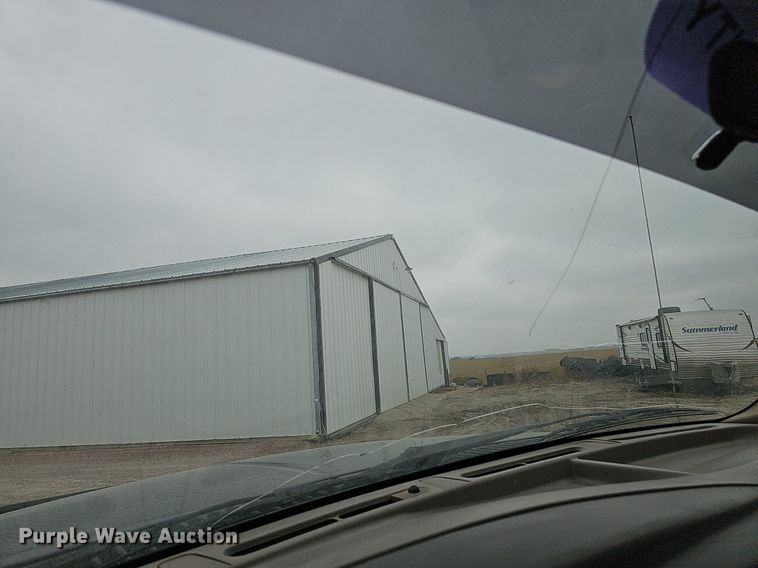 image for item DQ1147 2004 Ford F250 Super Duty Lariat  Crew Cab flatbed pickup truck