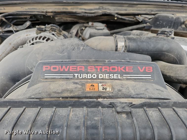 image for item DQ1147 2004 Ford F250 Super Duty Lariat  Crew Cab flatbed pickup truck