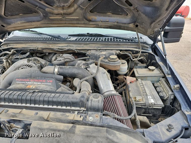 image for item DQ1147 2004 Ford F250 Super Duty Lariat  Crew Cab flatbed pickup truck