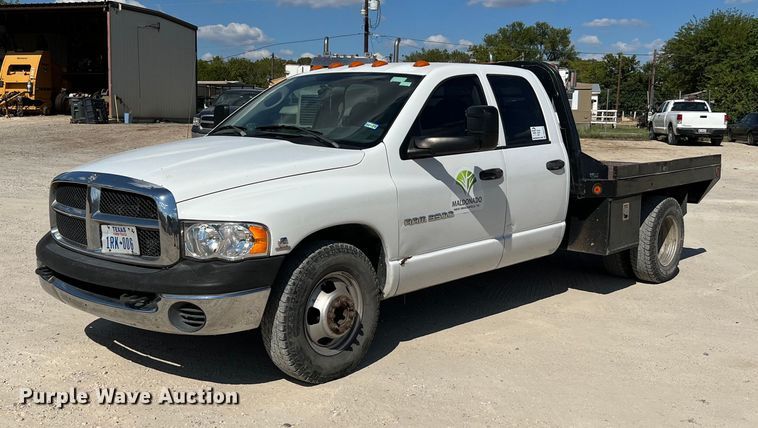 image for item DQ2215 2005 Dodge Ram 3500  Quad Cab flatbed pickup truck