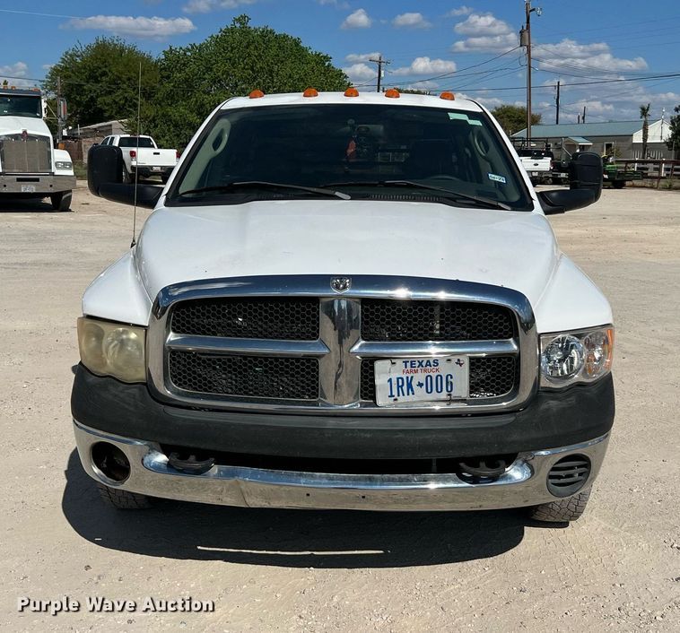 image for item DQ2215 2005 Dodge Ram 3500  Quad Cab flatbed pickup truck