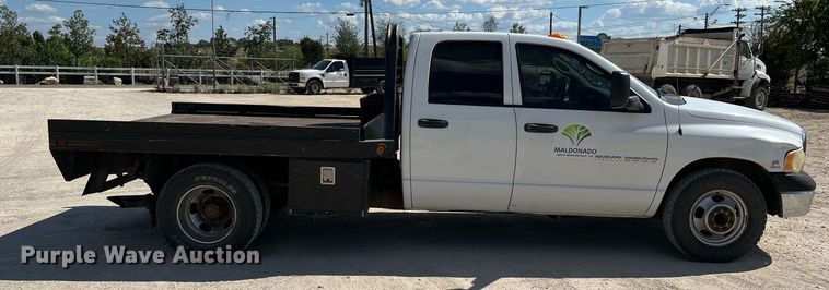 image for item DQ2215 2005 Dodge Ram 3500  Quad Cab flatbed pickup truck