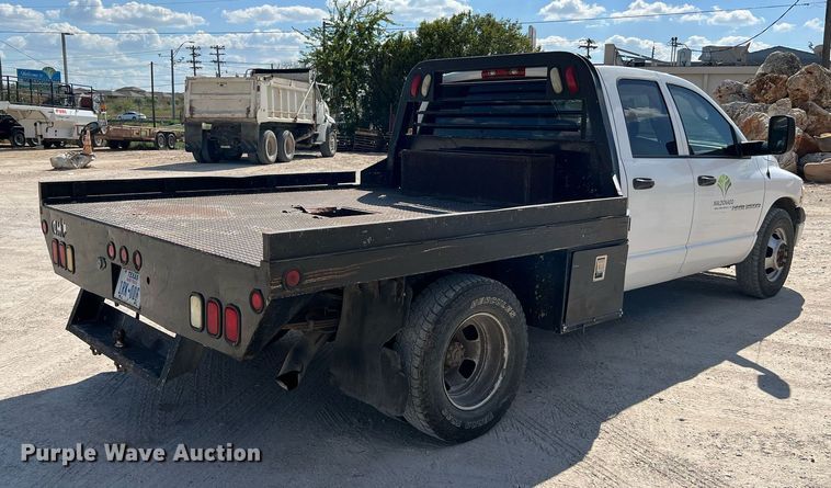 image for item DQ2215 2005 Dodge Ram 3500  Quad Cab flatbed pickup truck