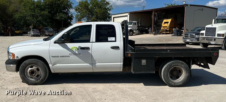 image for item DQ2215 2005 Dodge Ram 3500  Quad Cab flatbed pickup truck