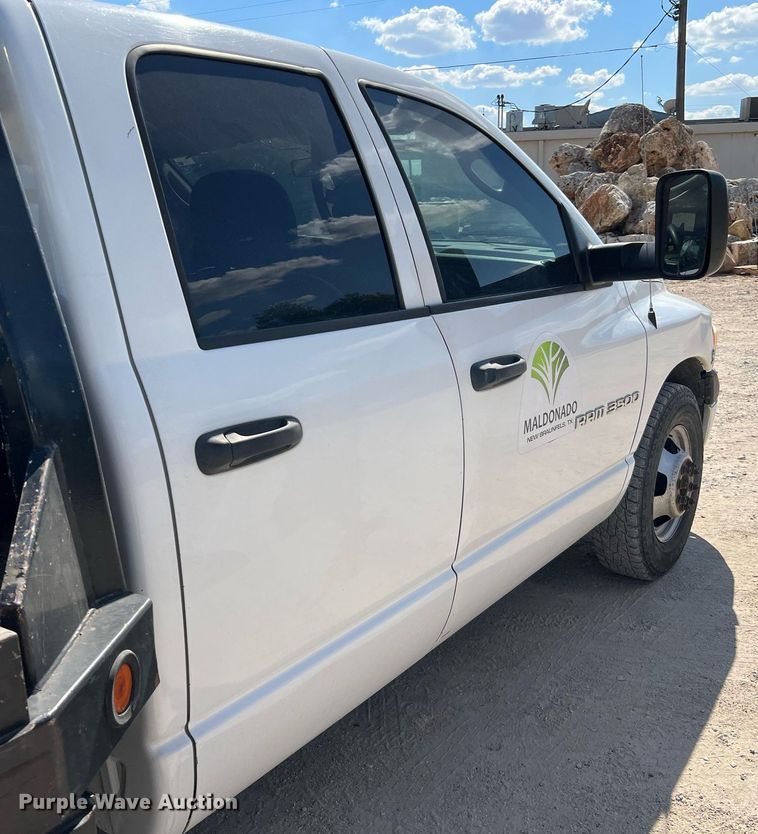 image for item DQ2215 2005 Dodge Ram 3500  Quad Cab flatbed pickup truck