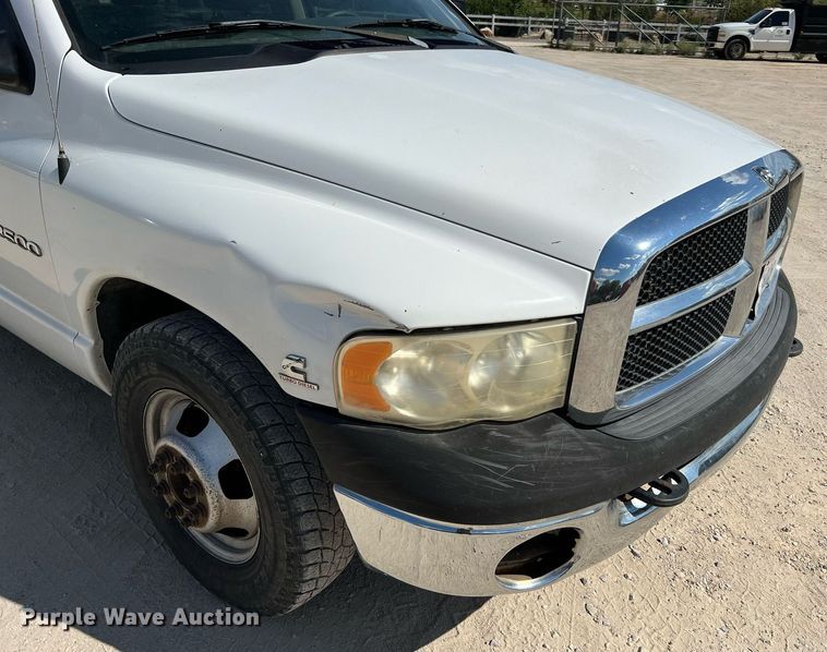 image for item DQ2215 2005 Dodge Ram 3500  Quad Cab flatbed pickup truck