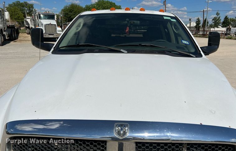 image for item DQ2215 2005 Dodge Ram 3500  Quad Cab flatbed pickup truck