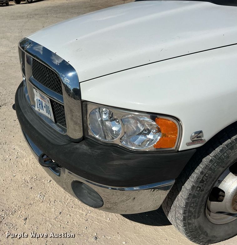 image for item DQ2215 2005 Dodge Ram 3500  Quad Cab flatbed pickup truck
